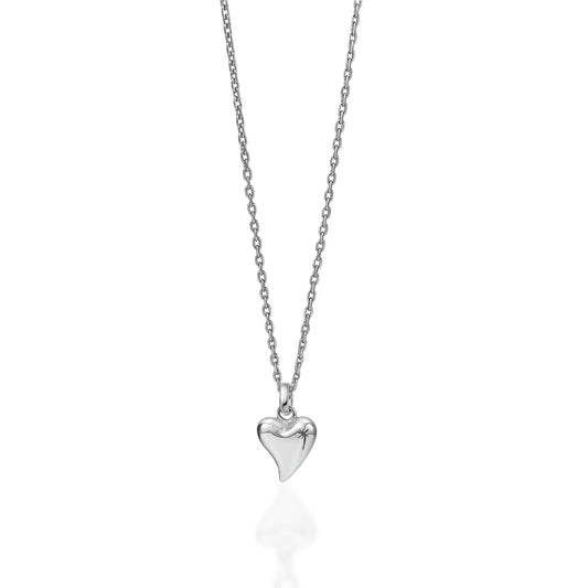 Silver heart-shaped pendant on a chain against a white background
