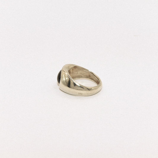 Silver ring on a white background