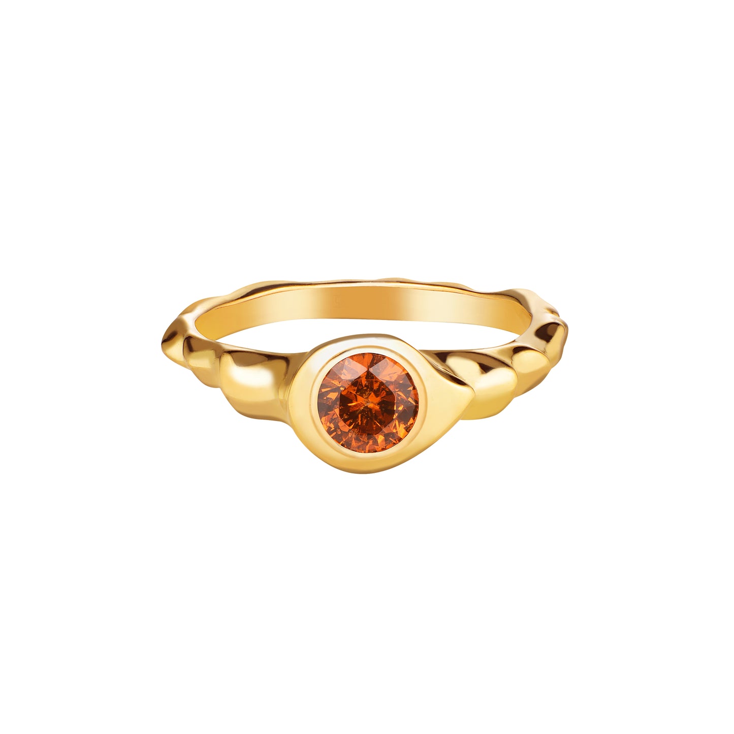A round cut orange garnet stone set in a gold ring with a polished finish.