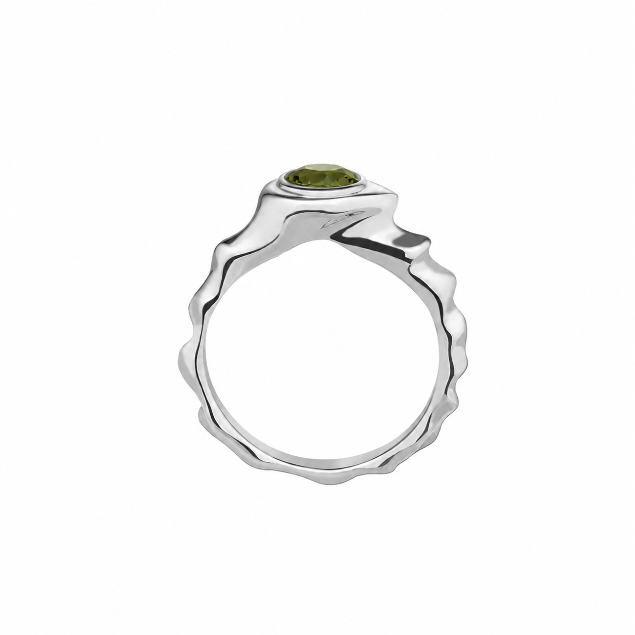 Silver ring with a green gemstone on a white background