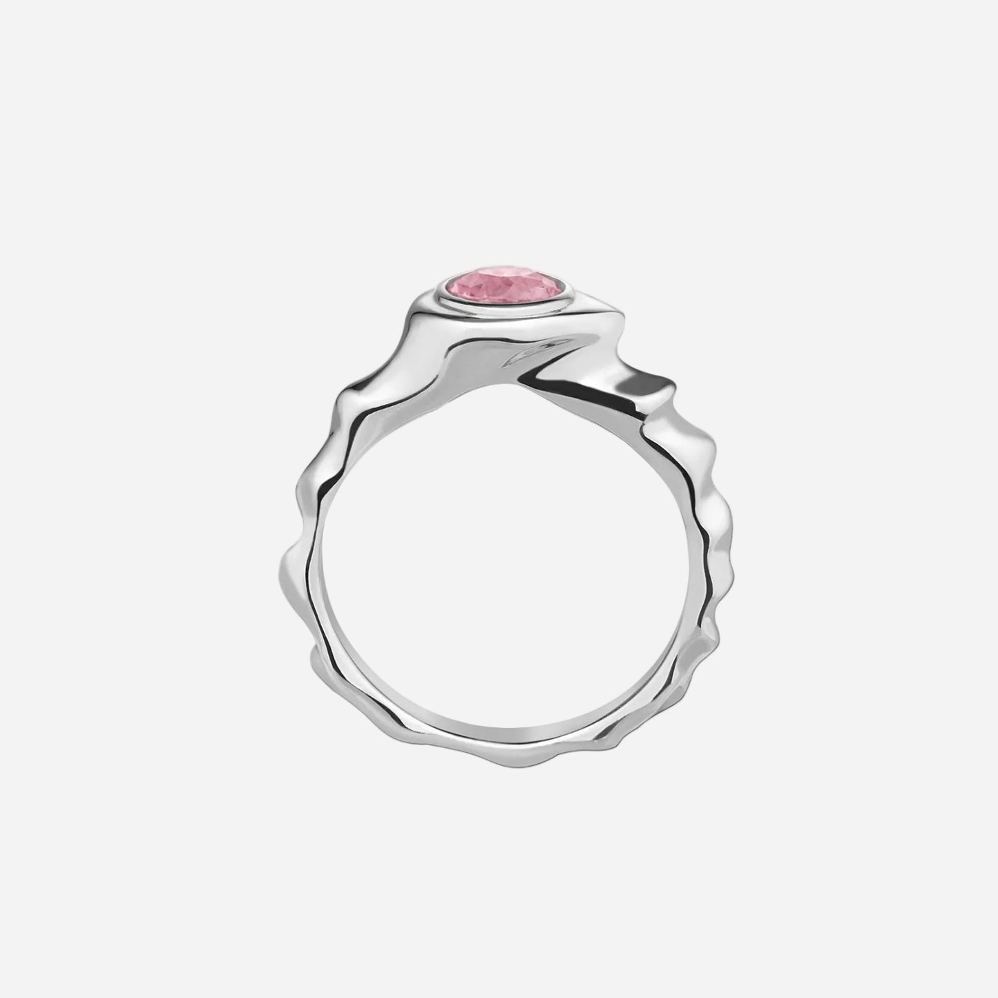 Silver ring with a pink gemstone on a white background