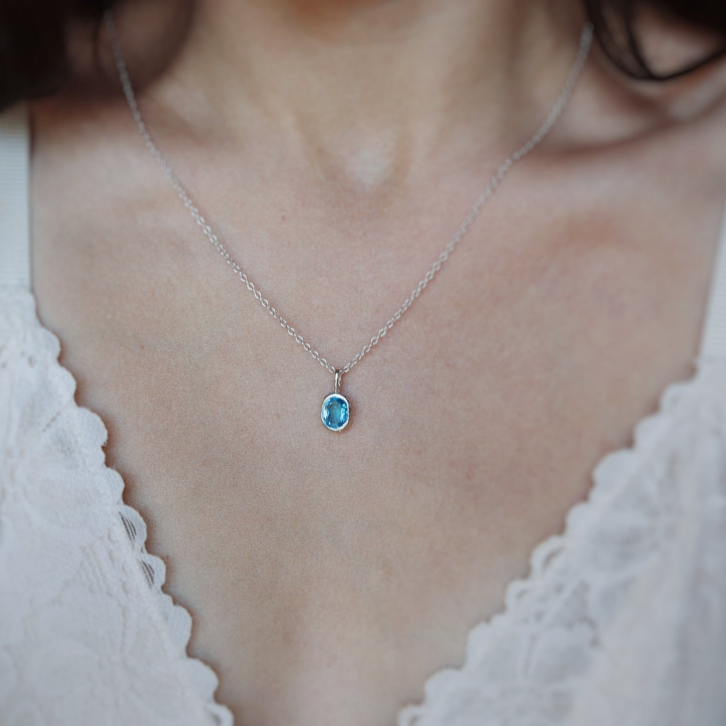 Oval Swiss Blue Topaz Silver Pendant