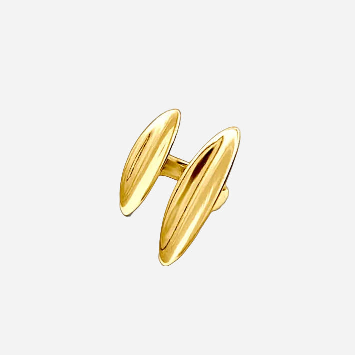 Gold cufflinks on a white background