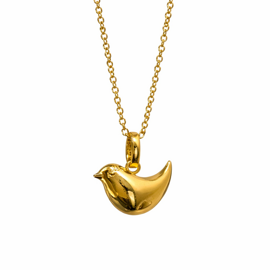Gold bird-shaped pendant on a chain against a white background