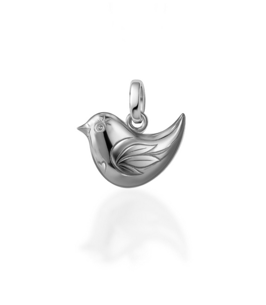 Silver bird-shaped pendant on a white background