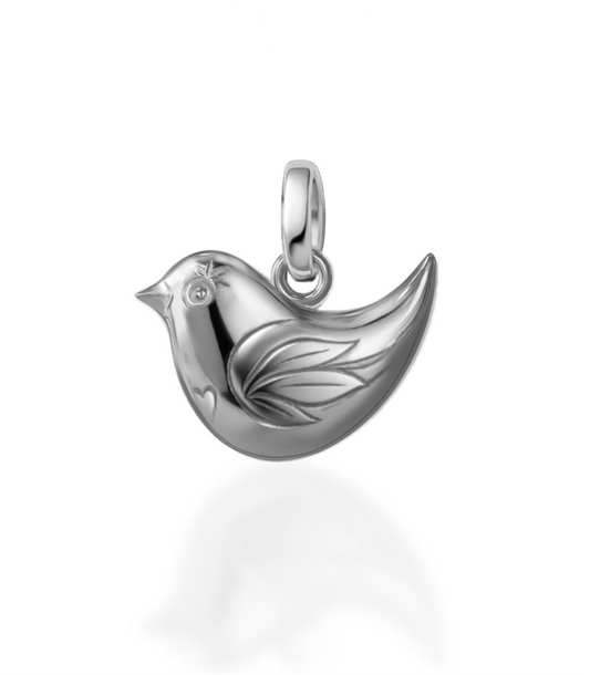 Silver bird-shaped pendant on a white background