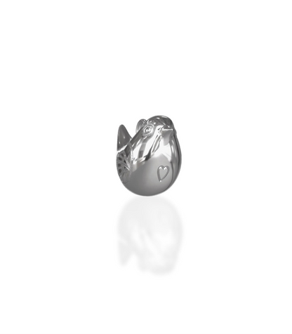 Silver ring with a heart design on a white background