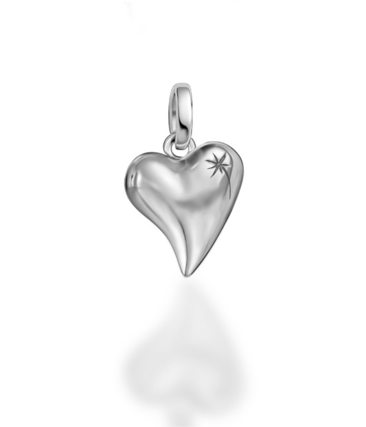 Silver heart-shaped pendant with a star design on a white background