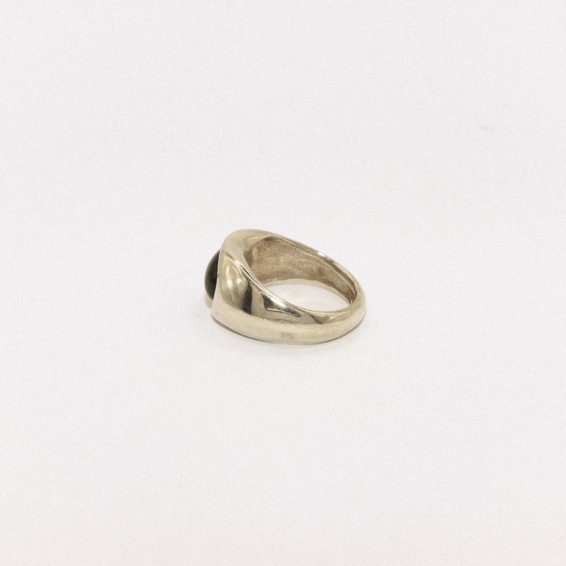 Silver ring on a white background