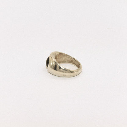 Silver ring on a white background