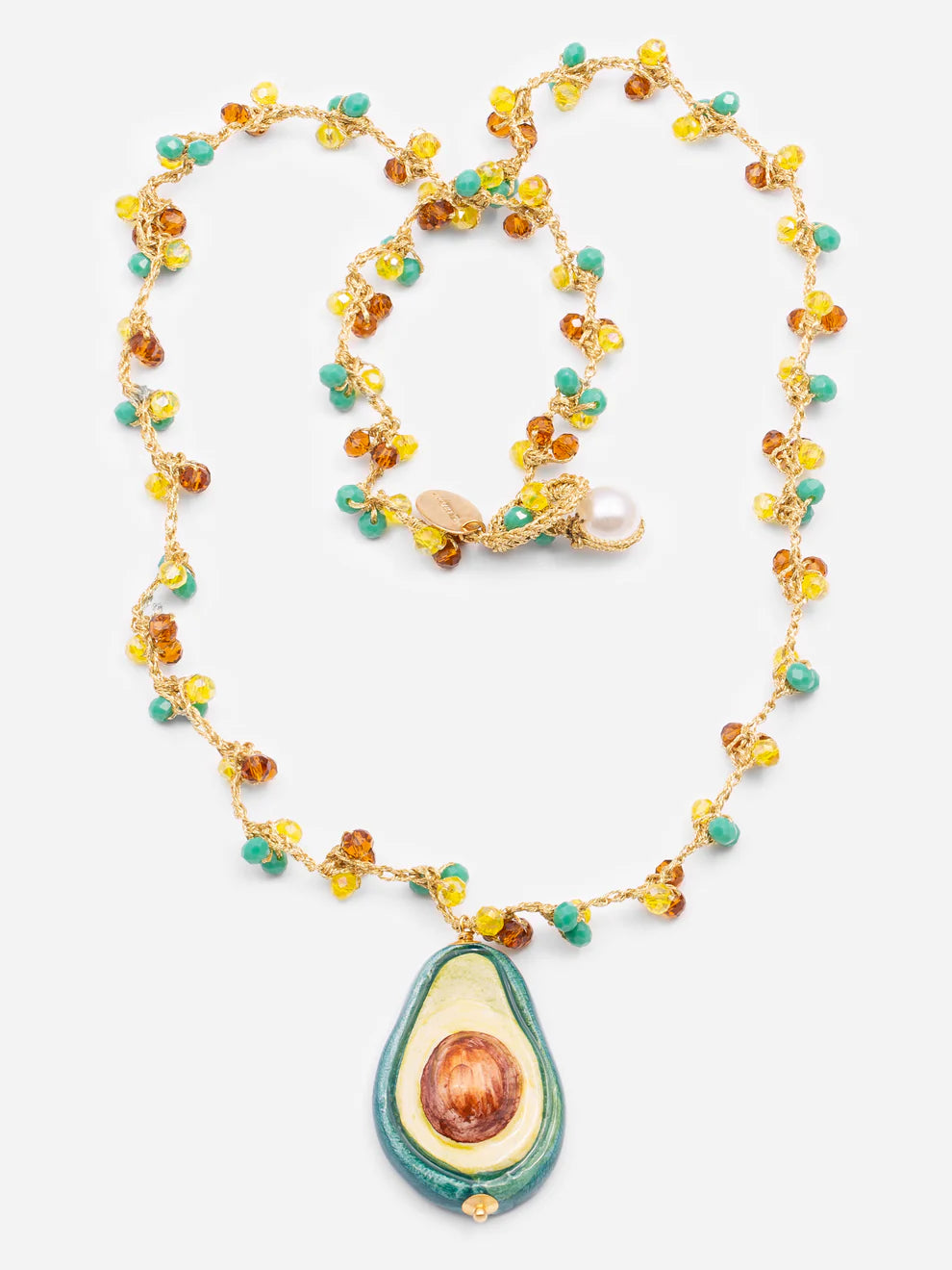 Necklace with avocado pendant and colorful beads on a white background