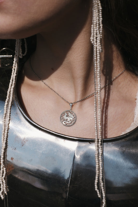 Confidence. Dragon pendant