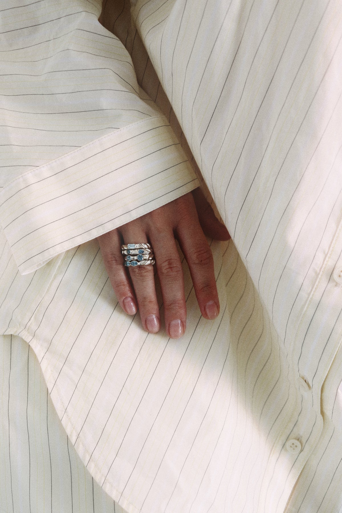 Dune Workshop rings photographed as an editorial jewelry detail