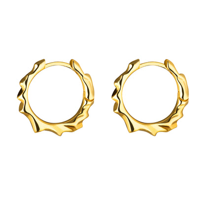 A pair of 14k gold hoop earrings with a polished finish.
