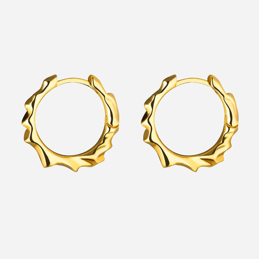 A pair of 14k gold hoop earrings with a polished finish.