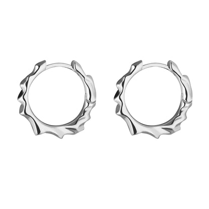 A pair of silver hoop earrings with a polished finish.