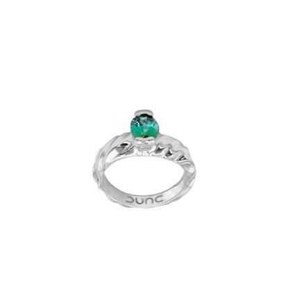 An oval tourmaline ring with a silver rhodium plated band and a polished finish, featuring a green stone.