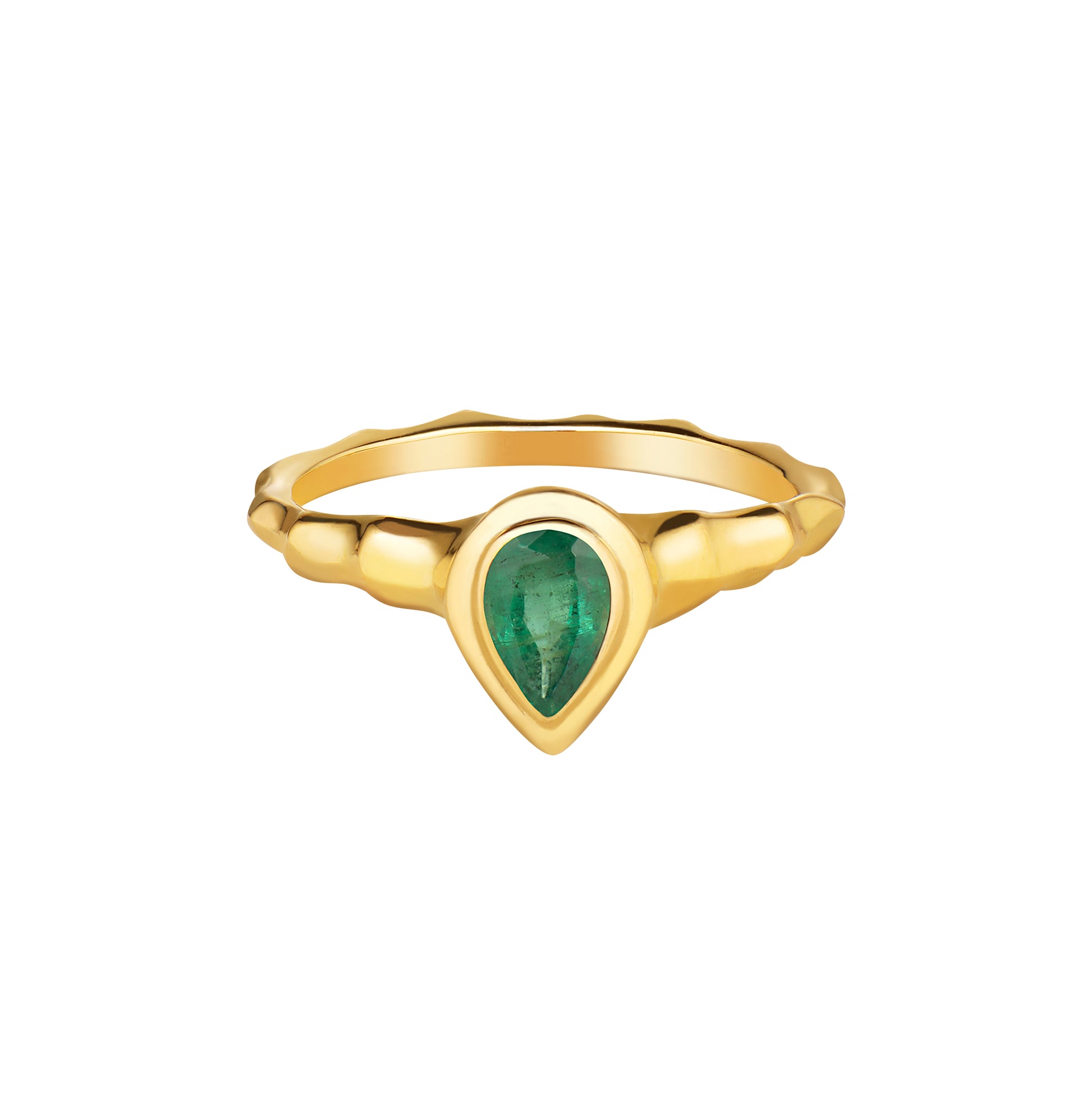 A 14k yellow gold ring with a pear cut emerald