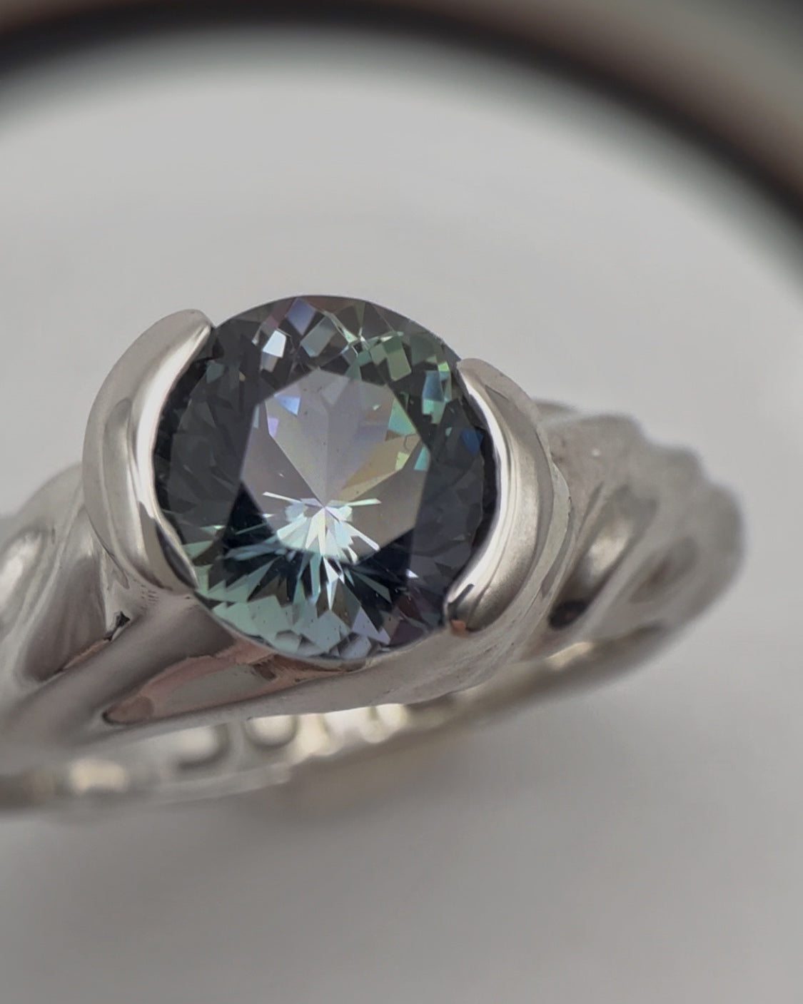 SWIRL TANZANITE RING