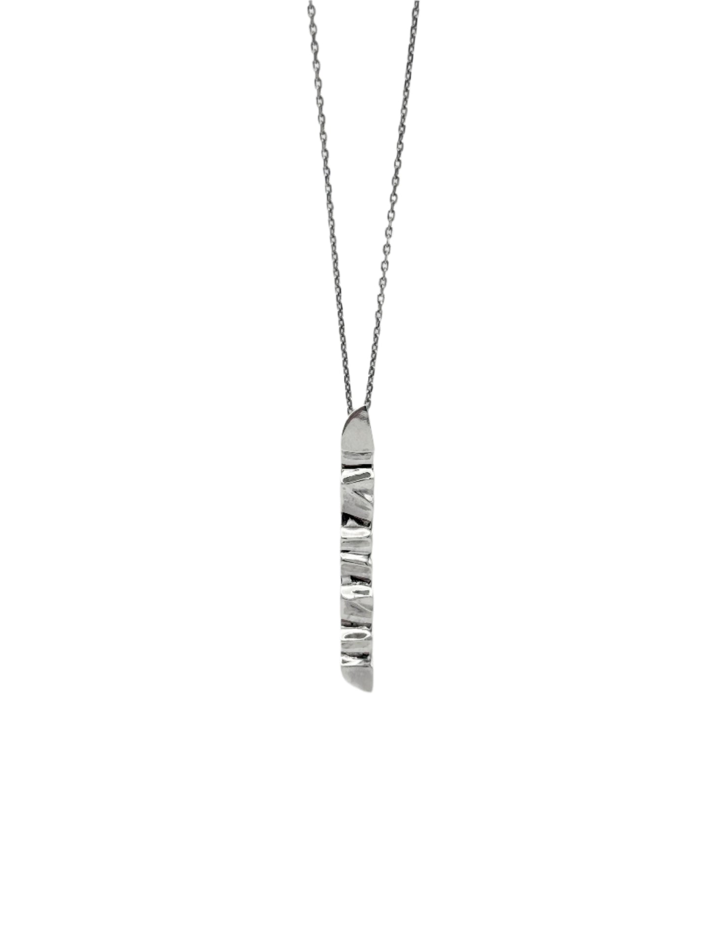 A sterling silver pendant with a wave design, suspended from a chain.