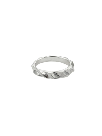 A silver ring with a hand-carved design featuring elegant curves and a rectangular profile.
