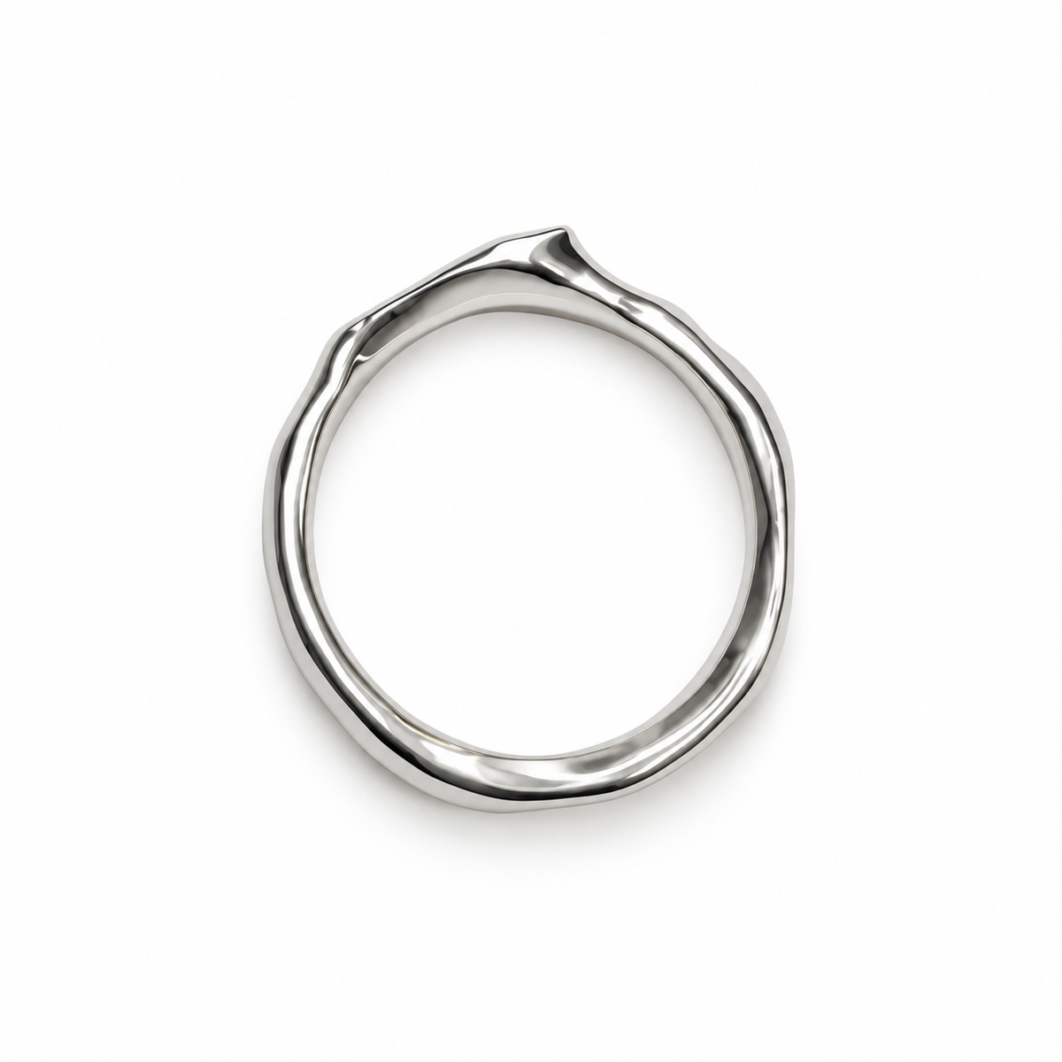 A polished silver ring with an organic, wavy, fluid contour, photographed from directly above on a clean white background.