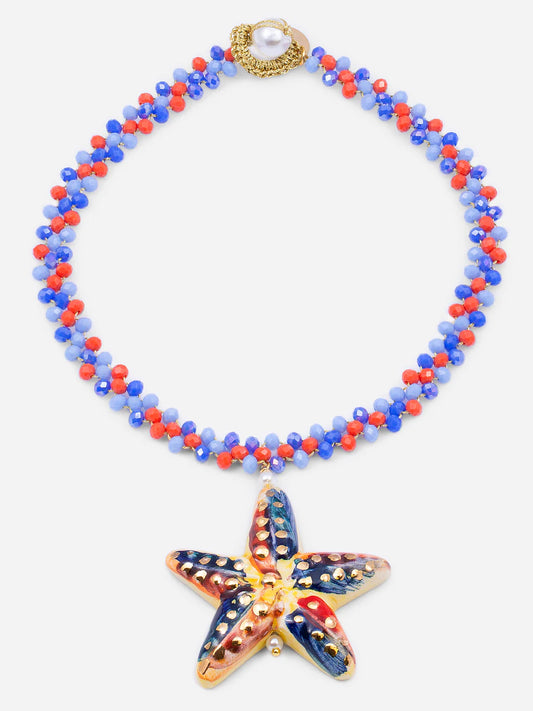 Necklace with starfish pendant and multicolored beads on a white background