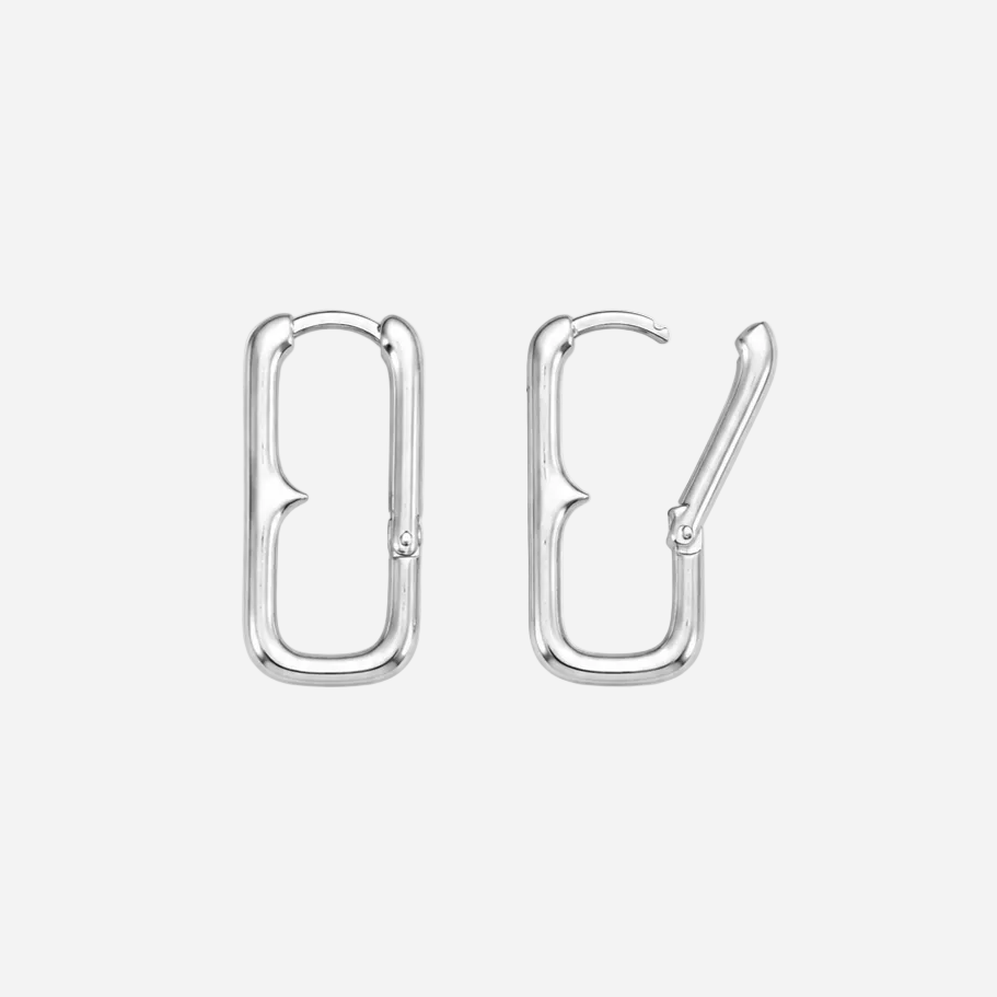 Pair of silver hoop earrings on a white background