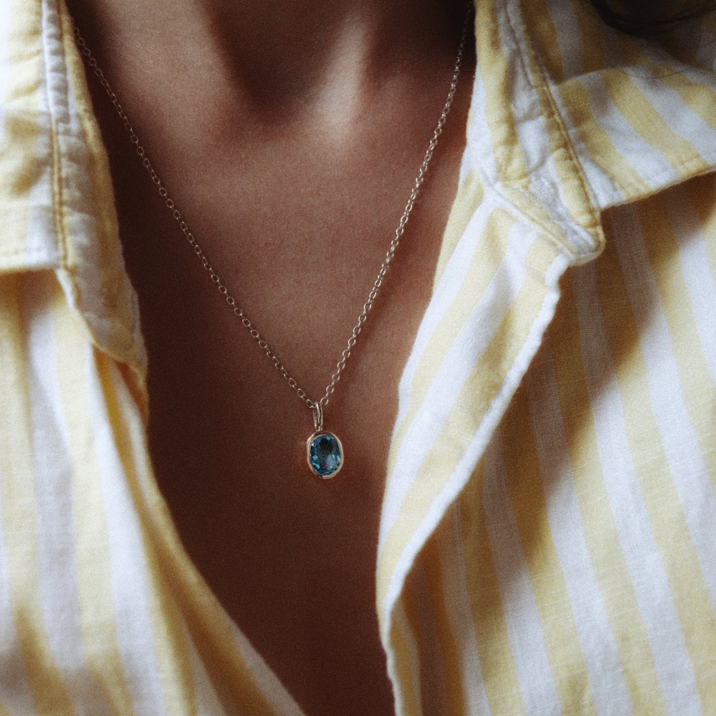 Oval Swiss Blue Topaz Silver Pendant