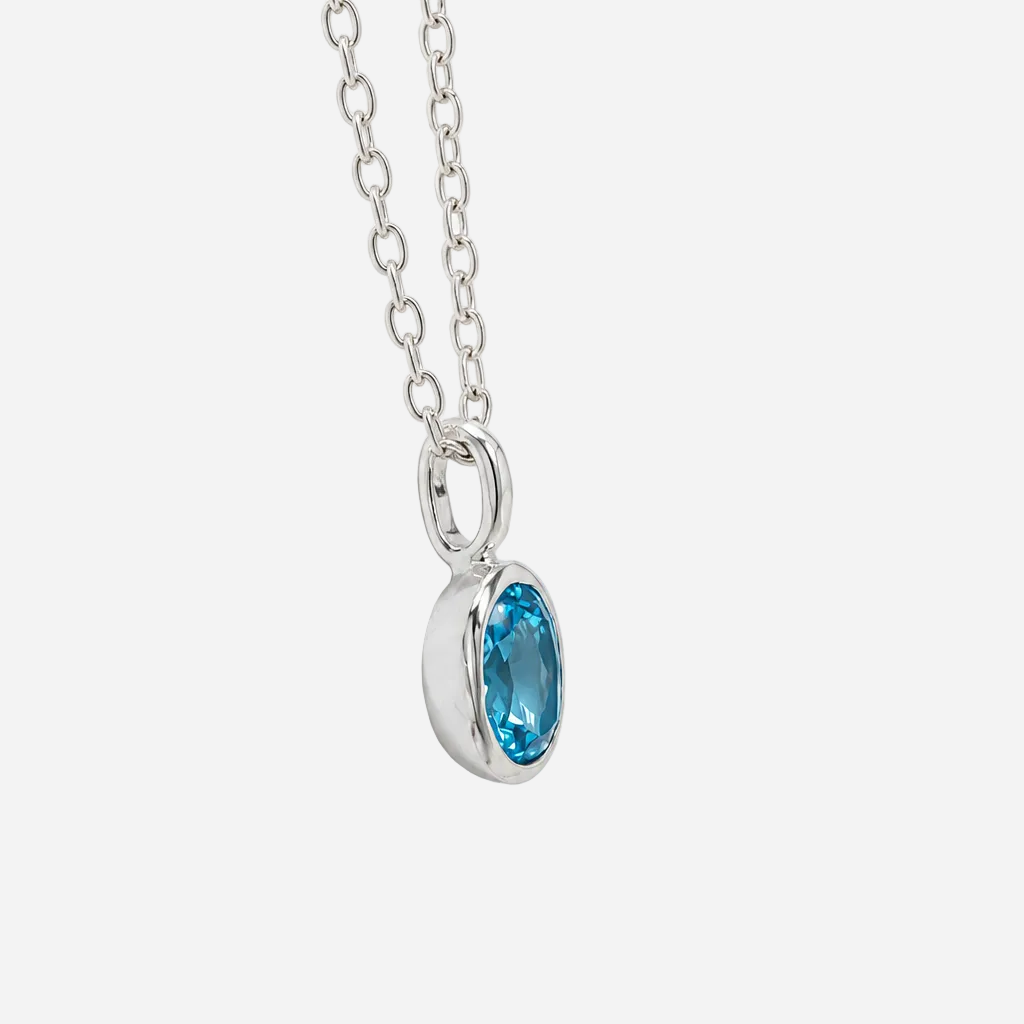 Oval Swiss Blue Topaz Silver Pendant