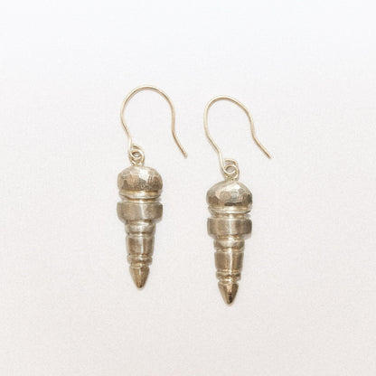 Silver spiral earrings on a white background
