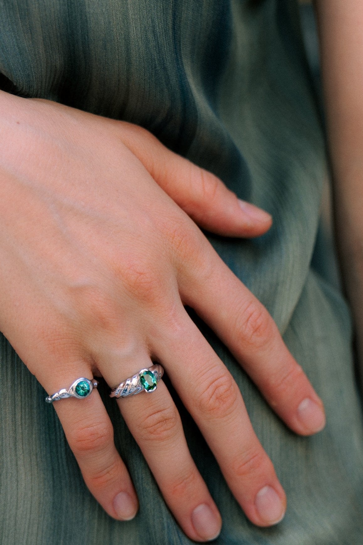 Green tourmaline ring worn on hand
