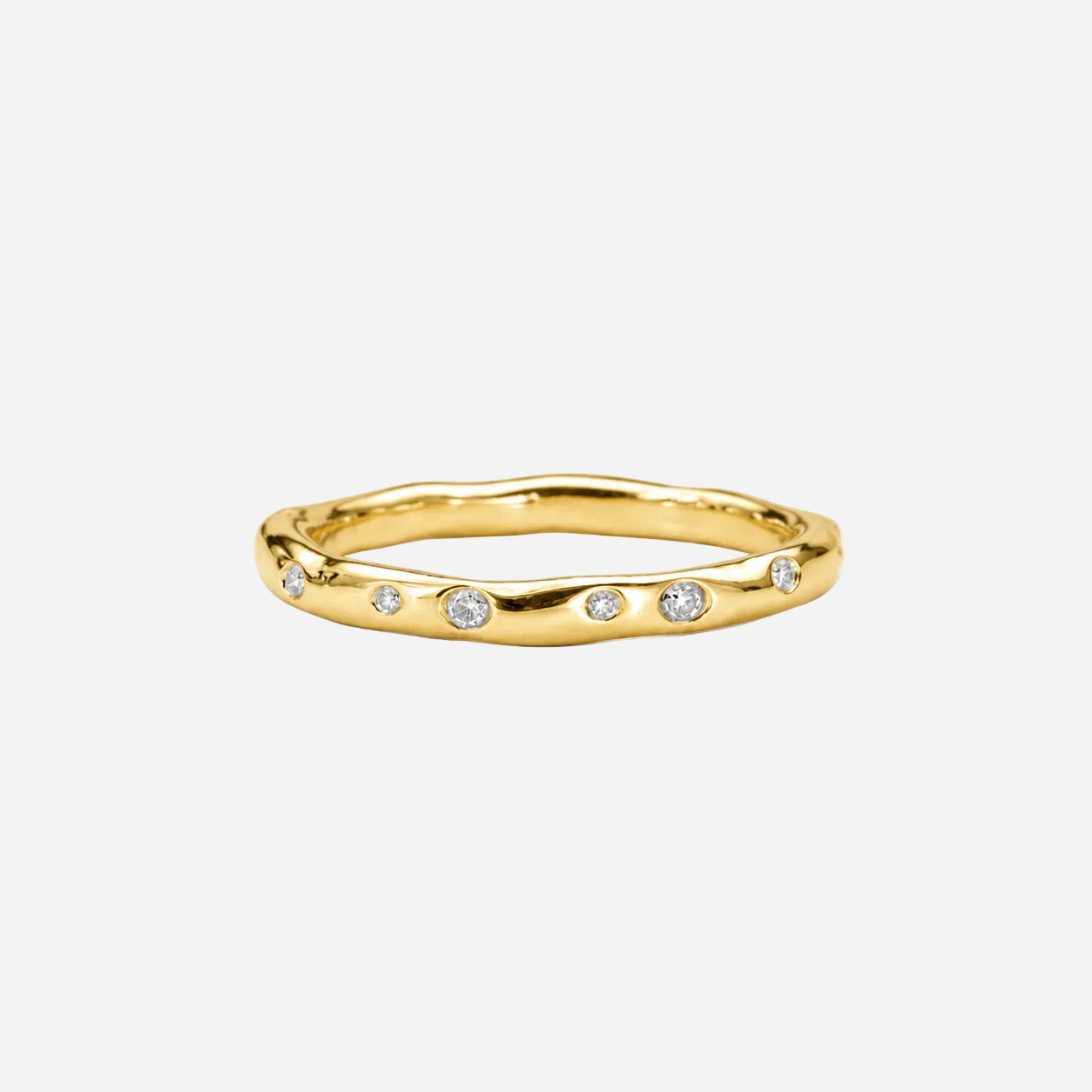 Gold ring with small diamonds on a white background